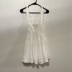 Short white altar’d state dress with lace